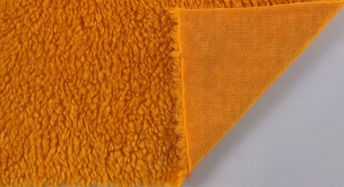 Leskymo beránek, oranžový, šíře 150cm (metráž)